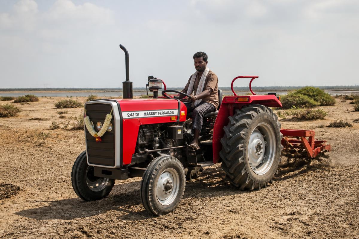 Red Massey Ferguson 241 DI tractor on dry coastal terrain
